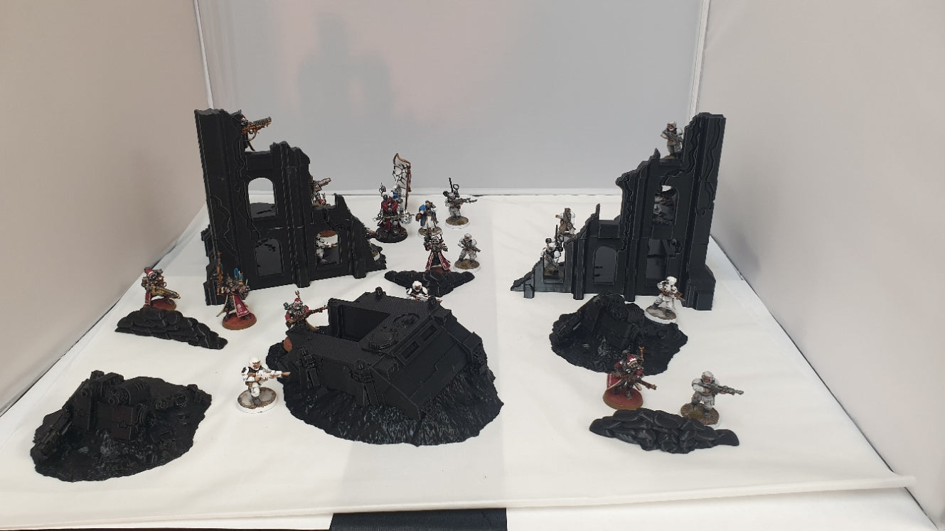 terrain scenery in black can be used for any minuture gaming 2 buildings 3 sandbags 1 wreaked rhino 2 wreaked dreadnought ruins