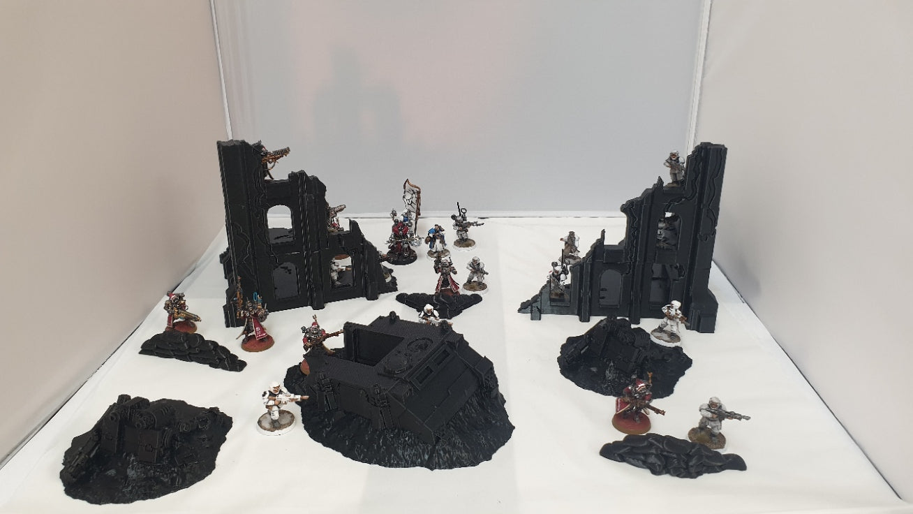 terrain scenery in black can be used for any minuture gaming 2 buildings 3 sandbags 1 wreaked rhino 2 wreaked dreadnought ruins