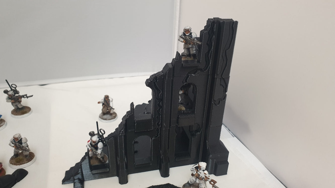 terrain scenery in black can be used for any minuture gaming 2 buildings 3 sandbags 1 wreaked rhino 2 wreaked dreadnought ruins
