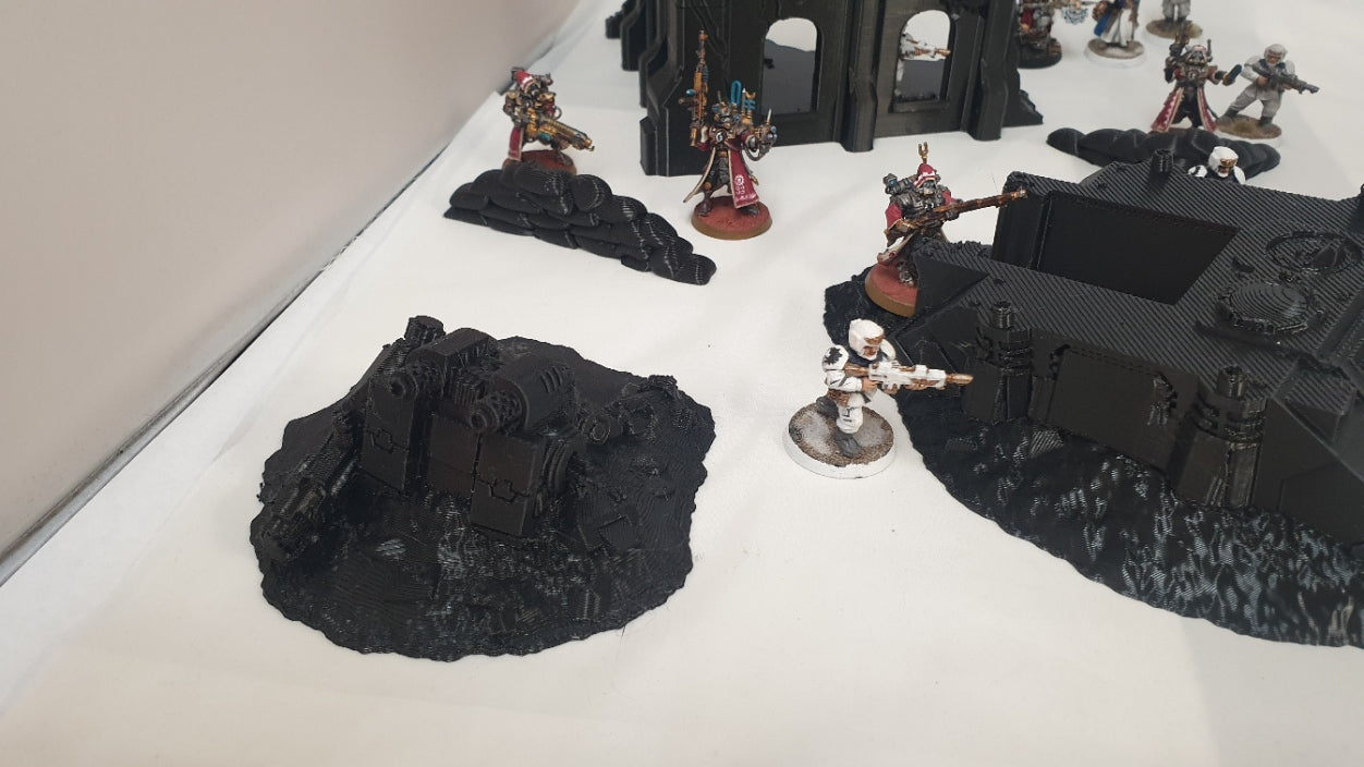 terrain scenery in black can be used for any minuture gaming 2 buildings 3 sandbags 1 wreaked rhino 2 wreaked dreadnought ruins