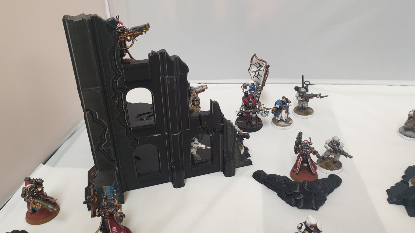terrain scenery in black can be used for any minuture gaming 2 buildings 3 sandbags 1 wreaked rhino 2 wreaked dreadnought ruins