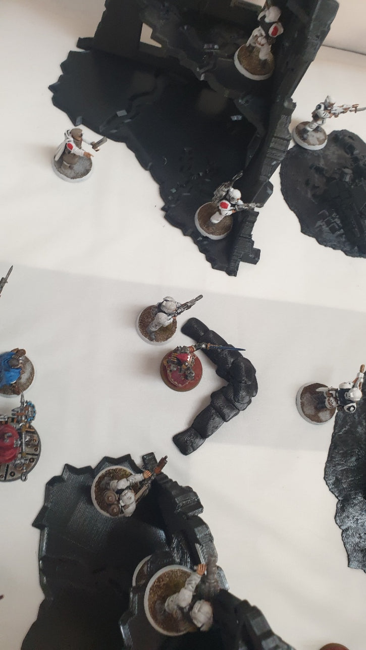 terrain scenery in black can be used for any minuture gaming 2 buildings 3 sandbags 1 wreaked rhino 2 wreaked dreadnought ruins